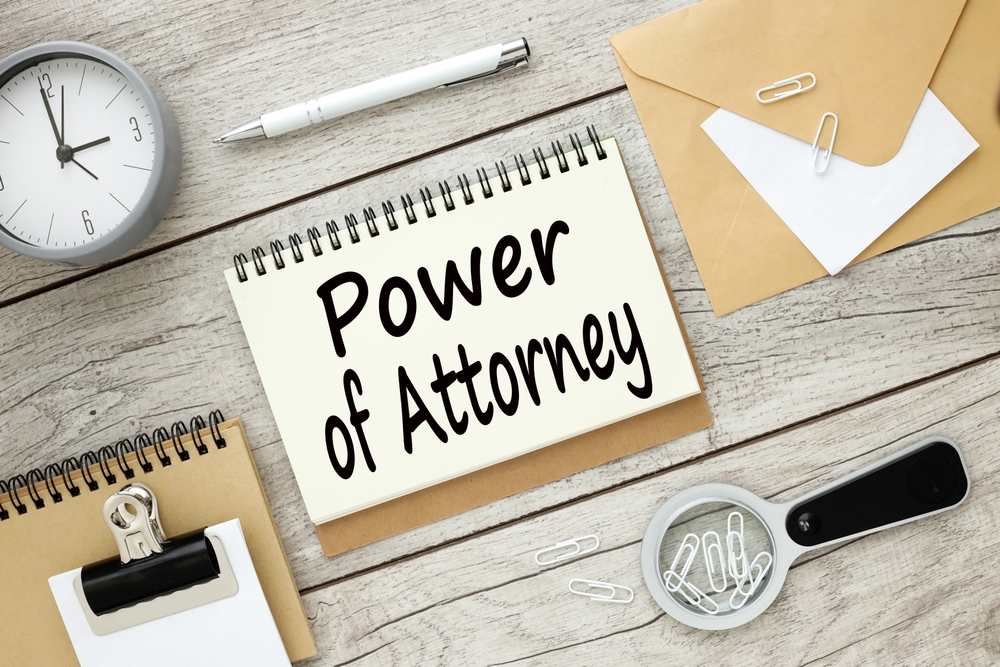 Power,Of,Attorney,Gray,Wooden,Table,Clock,Background ,Text,On