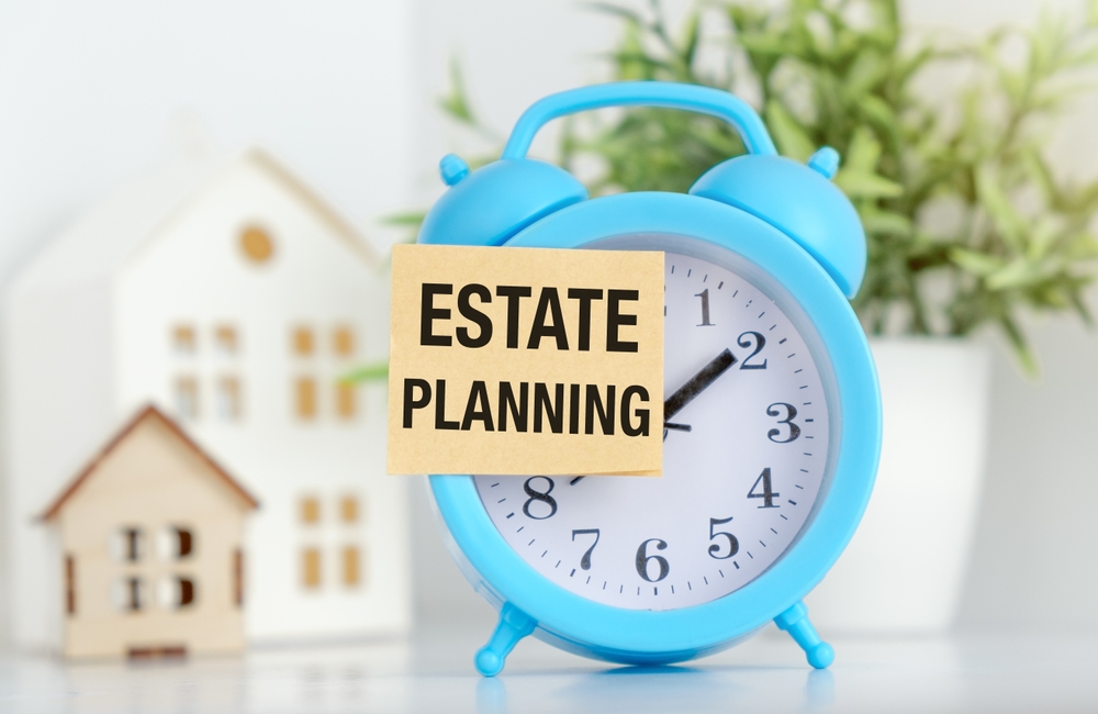 A,Blue,Alarm,Clock,With,A,White,Paper,That,Says