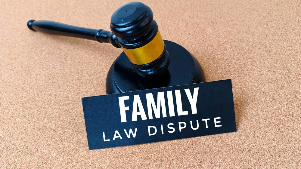 Family,Law,Dispute,With,Judge,Gavel,,Legal,Conflict,,Divorce